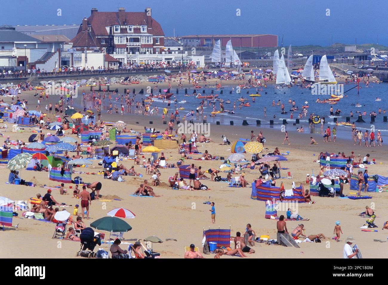 The beach and seafront in summertime at Gorleston-on-Sea Beach, near Great Yarmouth. Norfolk. England. UK Stock Photo