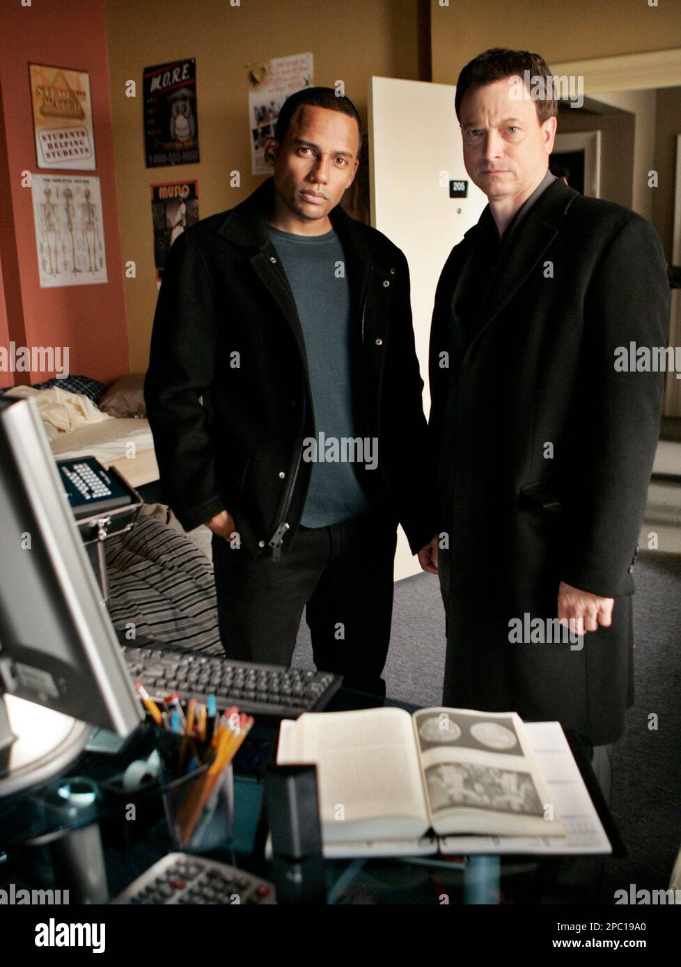 Actors Gary Sinise as Det. Mac Taylor, right, and Hill Harper as Dr.  Sheldon Hawkes pose on the set of "CSI:NY" in Los Angeles Wednesday, Jan.  10, 2007. (AP Photo/Reed Saxon Stock