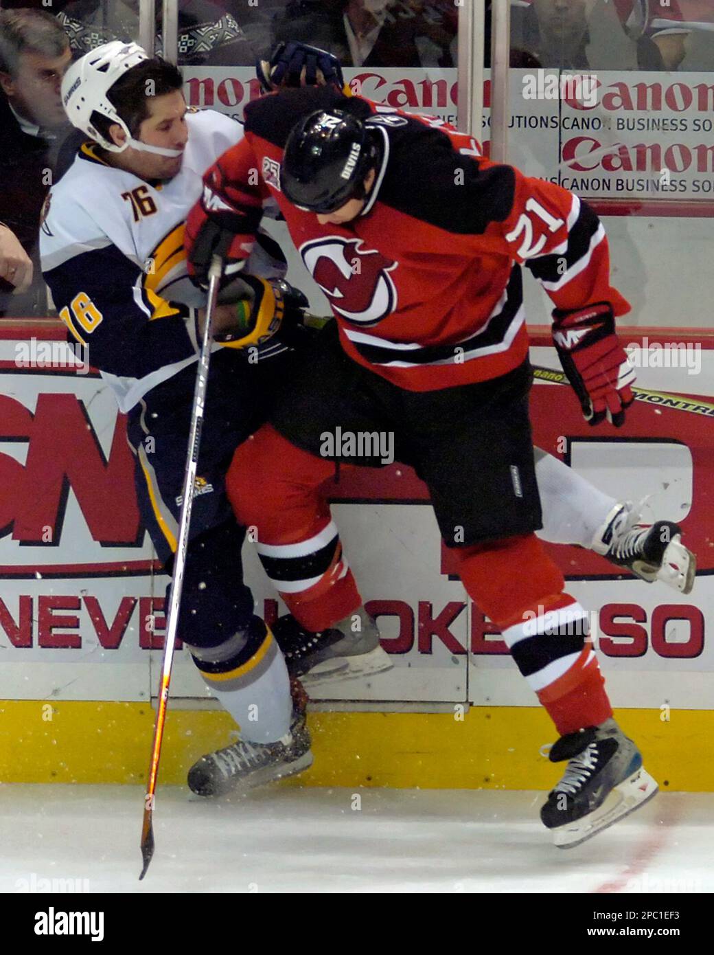 New Jersey Devils' Brad Lukowich (21) checks New York Rangers' Brendan  Shanahan during second period NHL hockey Tuesday night, Feb. 6, 2007 in  East Rutherford, N.J. (AP Photo/Bill Kostroun Stock Photo - Alamy