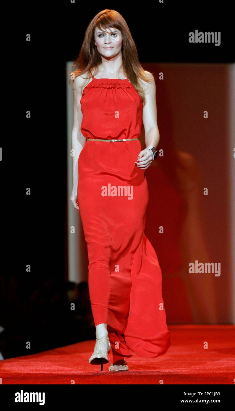 Model Helena Christensen, wearing a dress by designer Calvin Klein, walks  the runway during the Red Dress Heart Truth fashion show during Fashion  Week in New York, Friday Feb. 2, 2007. (AP