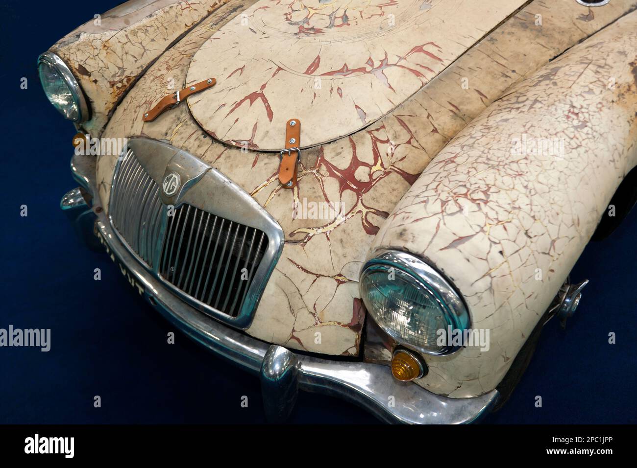 Close-up  view of the front of a Mechanically Restored, 1957, MGA part of the Barn Find Display, at the 2023 London Classic Car Show Stock Photo
