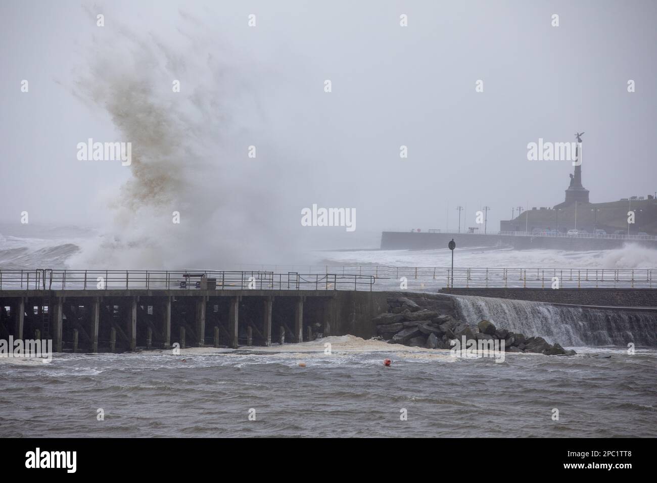 Aberystwyth, Ceredigion, Wales, UK. 13th March 2023 UK Weather: Strong winds, combined with incoming high tide brings large crashing waves along Aberystwyth sea defences this morning. © Ian Jones/Alamy Live News Stock Photo