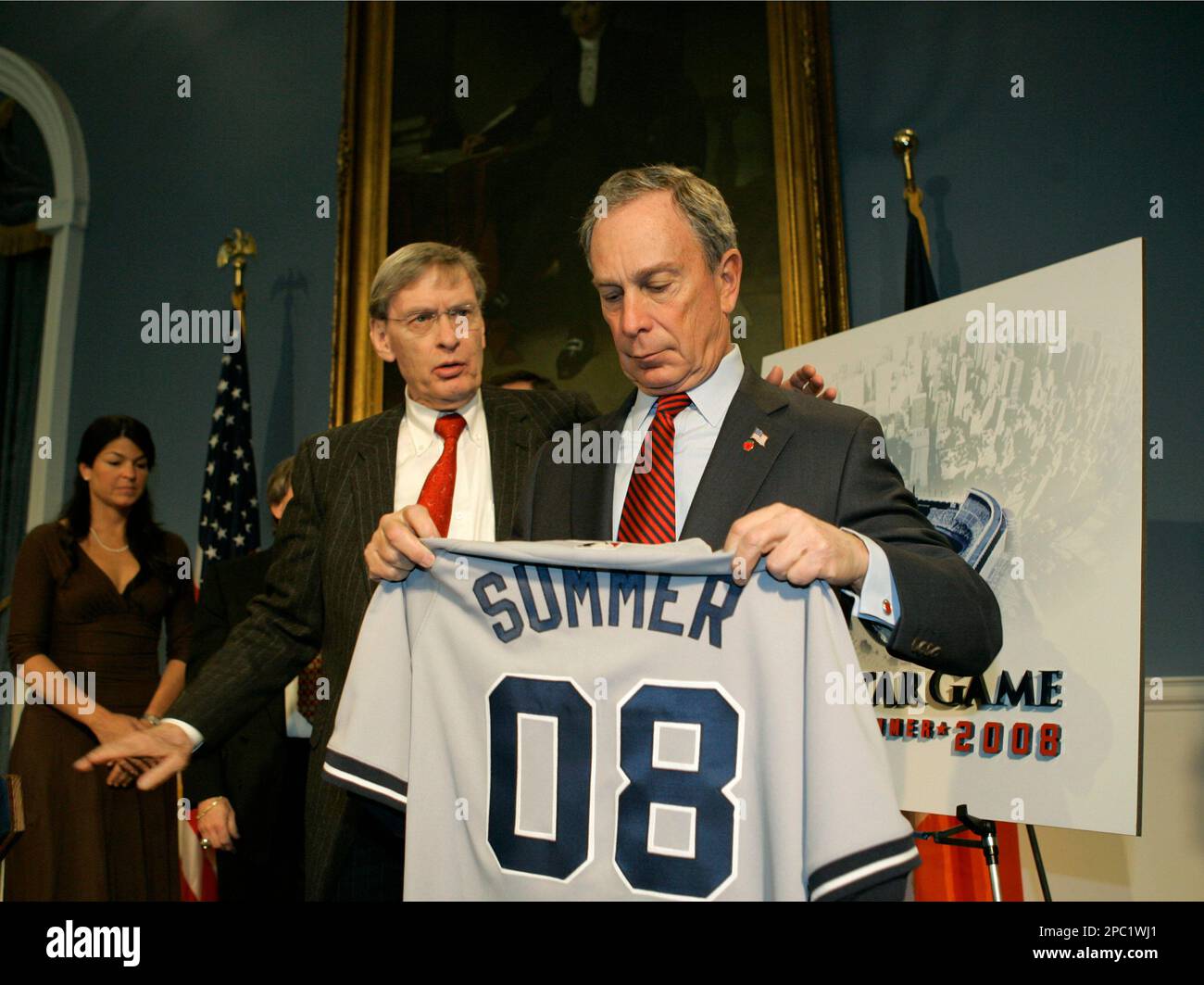Baseball commissioner Bud Selig, left, pats New York Mayor Michael  Bloomberg on the shoulder as they pose with a baseball jersey promoting the  2008 All Star Game after announcing that the game
