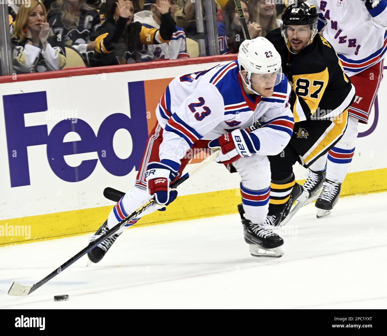 Pittsburgh, United States. 09th May, 2022. Pittsburgh Penguins center  Sidney Crosby (87) passes the puck pass New York Rangers defenseman Justin  Braun (61) during the second period of the Pens 7-2 win