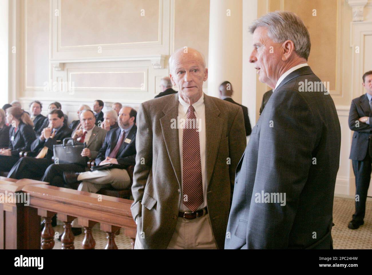 Arkansas Gov. Mike Beebe, right, speaks with Senate Revenue and