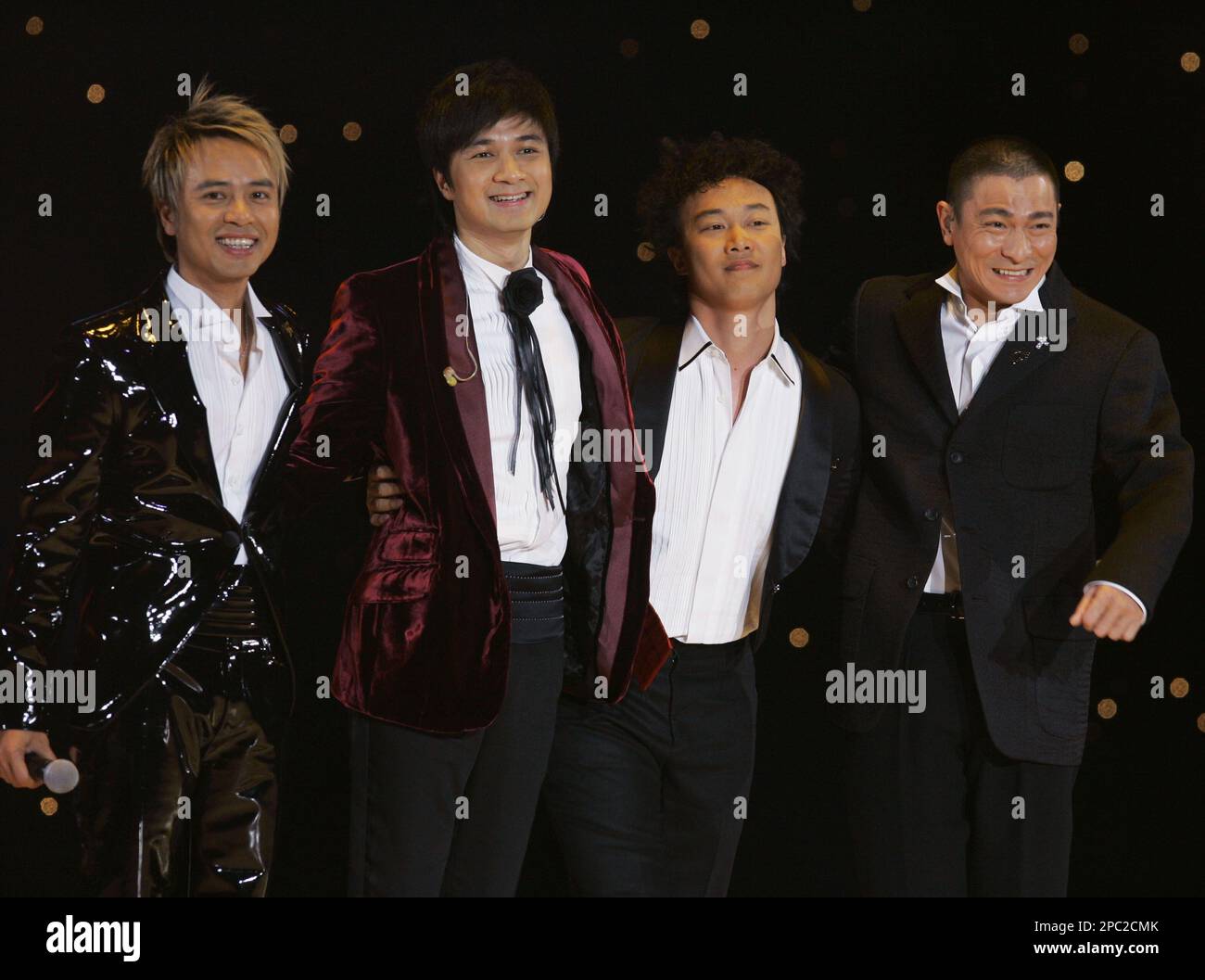 Hong Kong singers Hacken Lee, Leo Koo, Eason Chan and Andy Lau, from left,  greet the audience at the 29th Top Ten Chinese Gold Songs Awards in Hong  Kong Saturday, Jan. 27,
