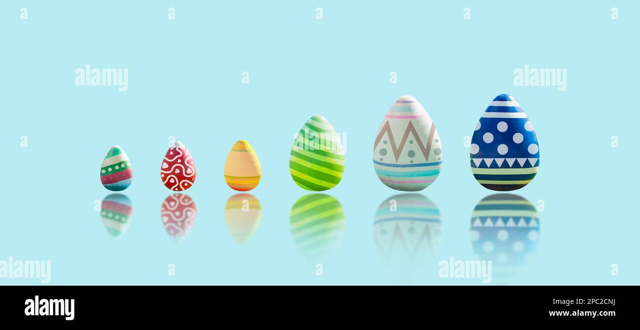 Easter eggs isolated is painted in different patterns on blue background with reflection, happy easter celebration concept, 3D illustration rendering Stock Photo