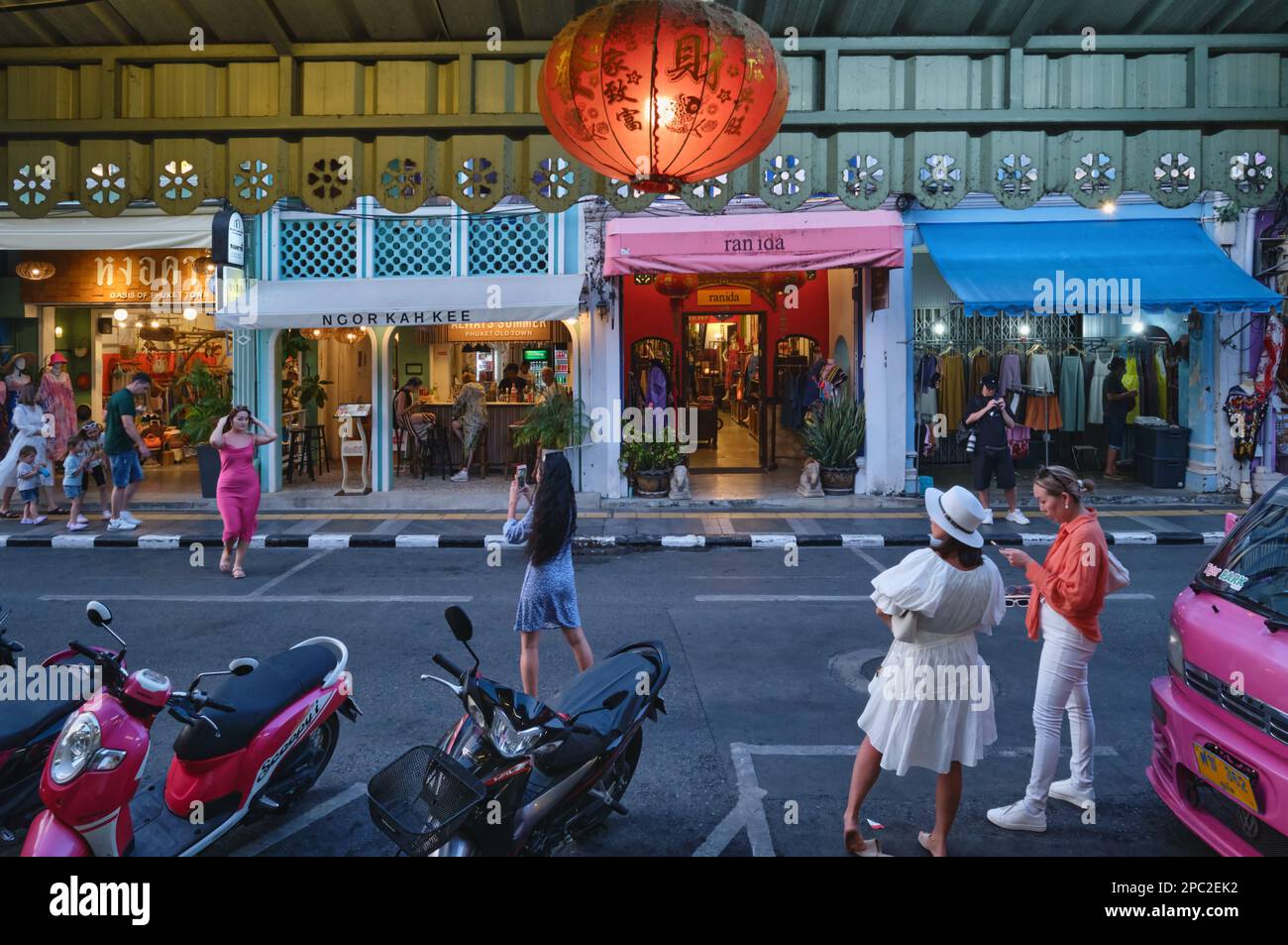 Foreign tourists visiting Thalang Road in the Old Town are of Phuket Town, Phuket, Thailand, enjoying the traditional Sino-Portuguese architecture Stock Photo