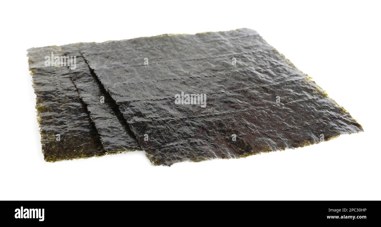 Many dry nori sheets on white background Stock Photo Alamy