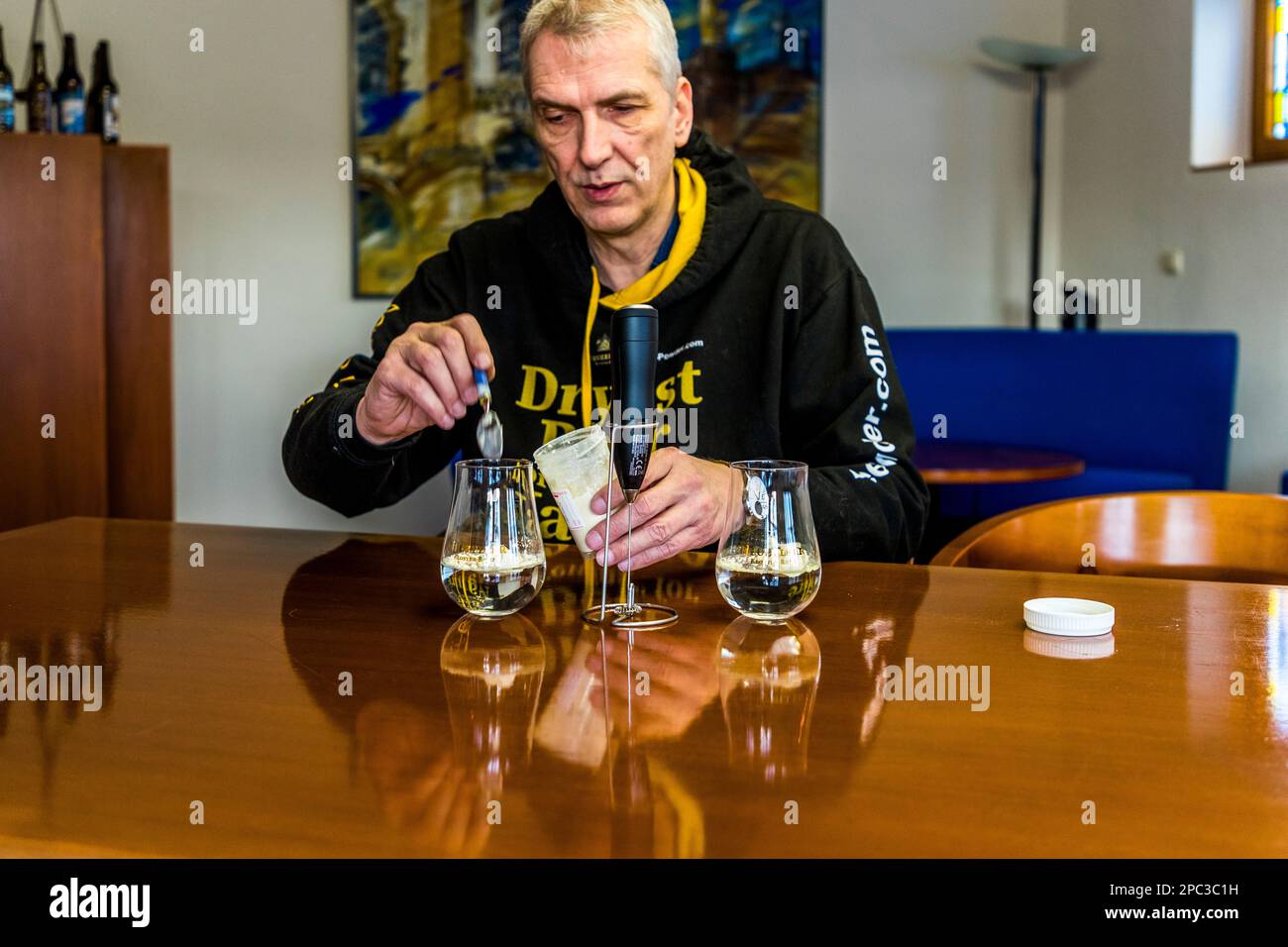 Stephan Fritsche, managing director of the German Klosterbrauerei Neuzelle (monastery brewery) demonstrates the novel beer powder under development Stock Photo