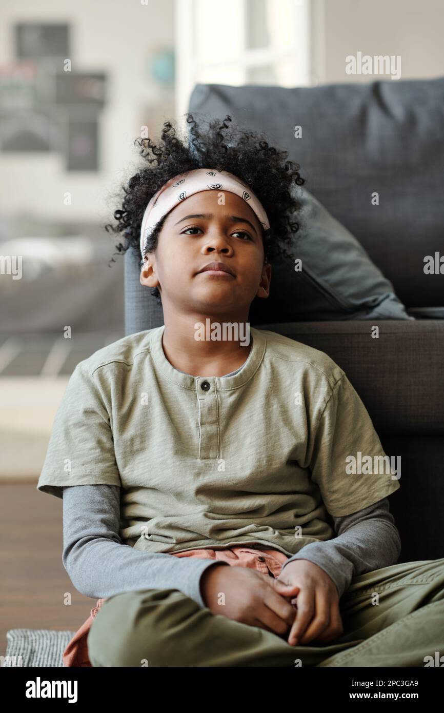 African american kid trying on hi-res stock photography and images - Alamy