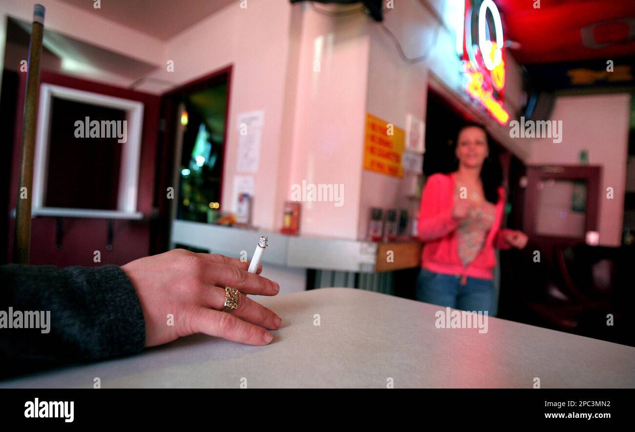 cigarette smoke images Close-up of Person Smoking Cigarette in Dark · Free Stock Photo