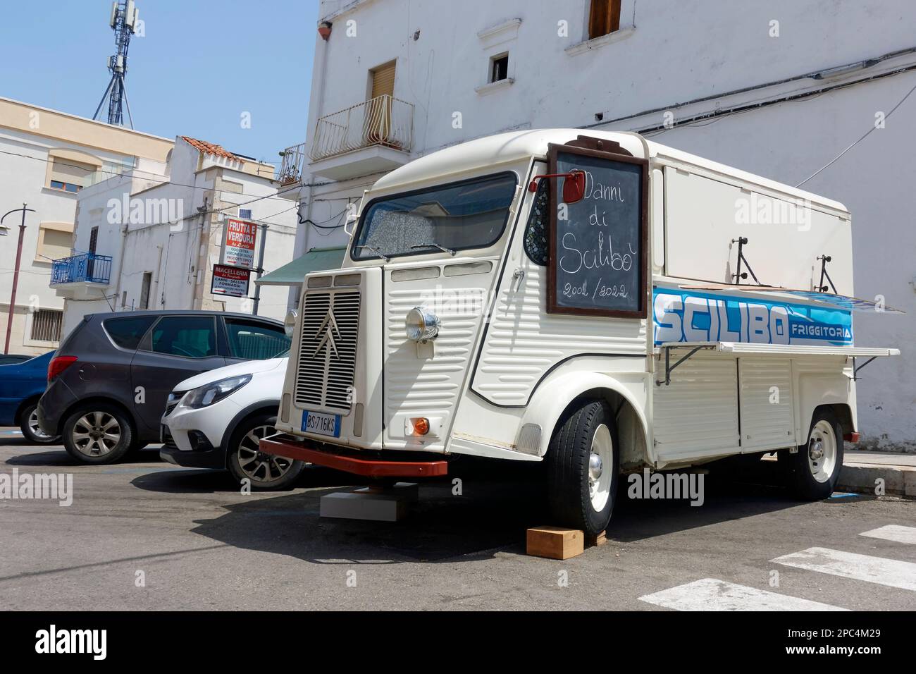 A Citroen van converted as a Friggitoria (seller of fried food). Peschici, Apulia (Puglia), Italy. Stock Photo