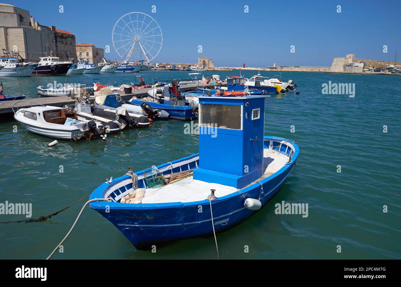 A fishing boat in the harbour at Trani, Apulia (Puglia), Italy. Stock Photo