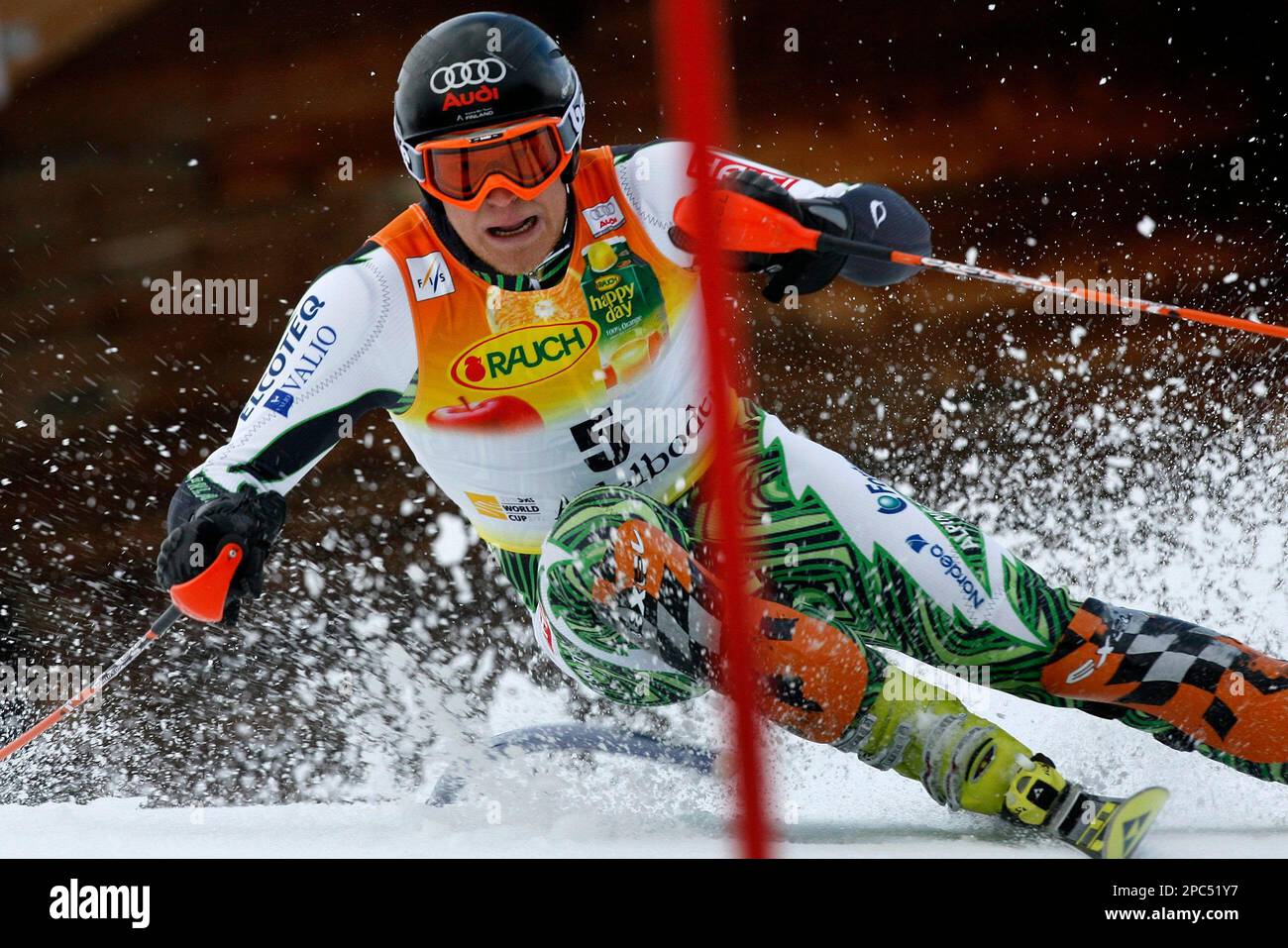 Ski racer Kalle Palander from Finland clears a gate in the first run of ...