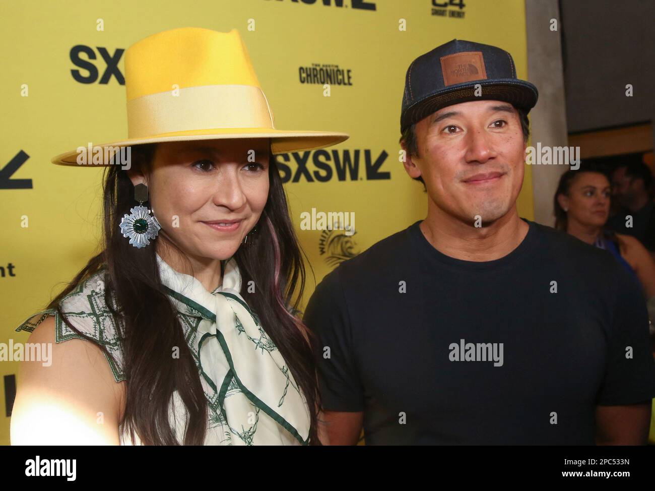 Elizabeth Chai Vasarhelyi, left, and Jimmy Chin arrive for the world