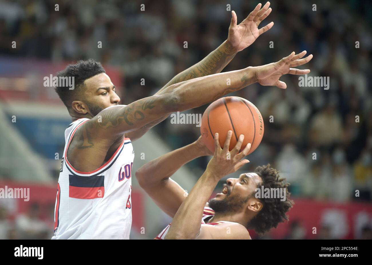 230313) -- GUANGZHOU, March 13, 2023 (Xinhua) -- Jarmar Gulley (R