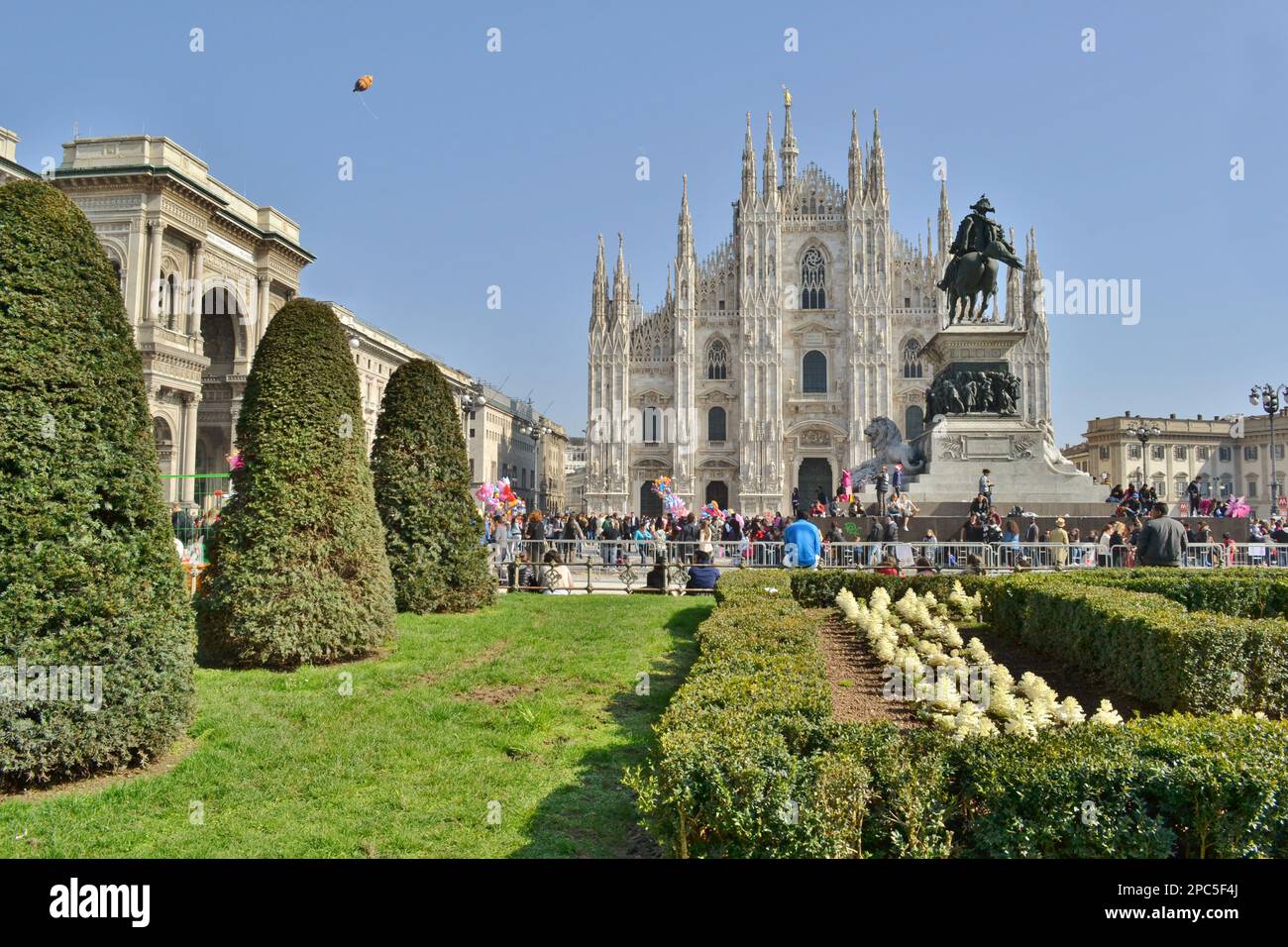 Panoramic view of the Duomo square of Milan during the traditional celebration of the Carnival holiday. Beautiful sunny weather. Duomo facade. Stock Photo