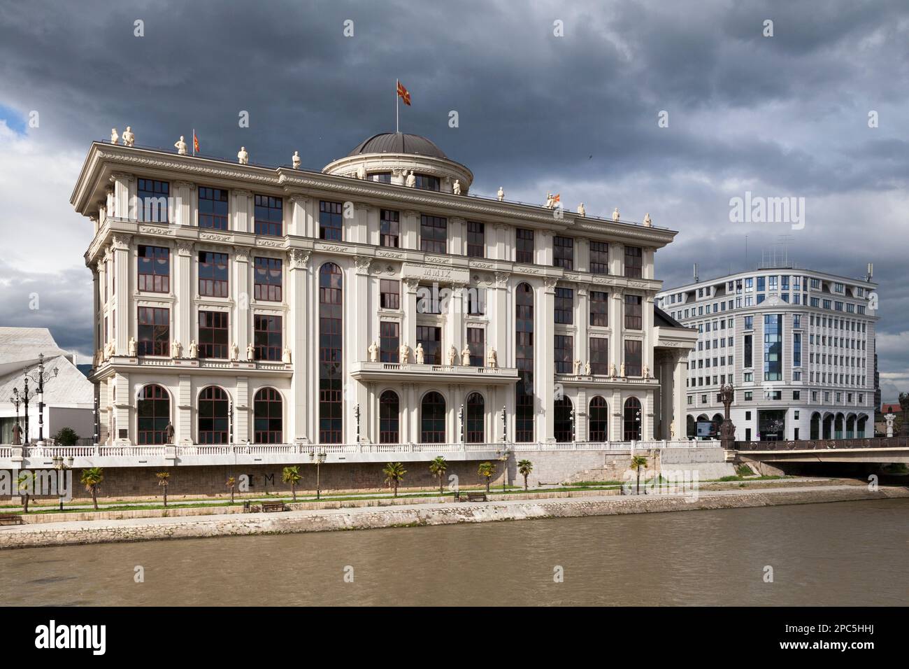Skopje, North Macedonia - May 20 2019: The Ministry of Foreign Affairs opposite the Vardar River next to the Freedom bridge. Stock Photo