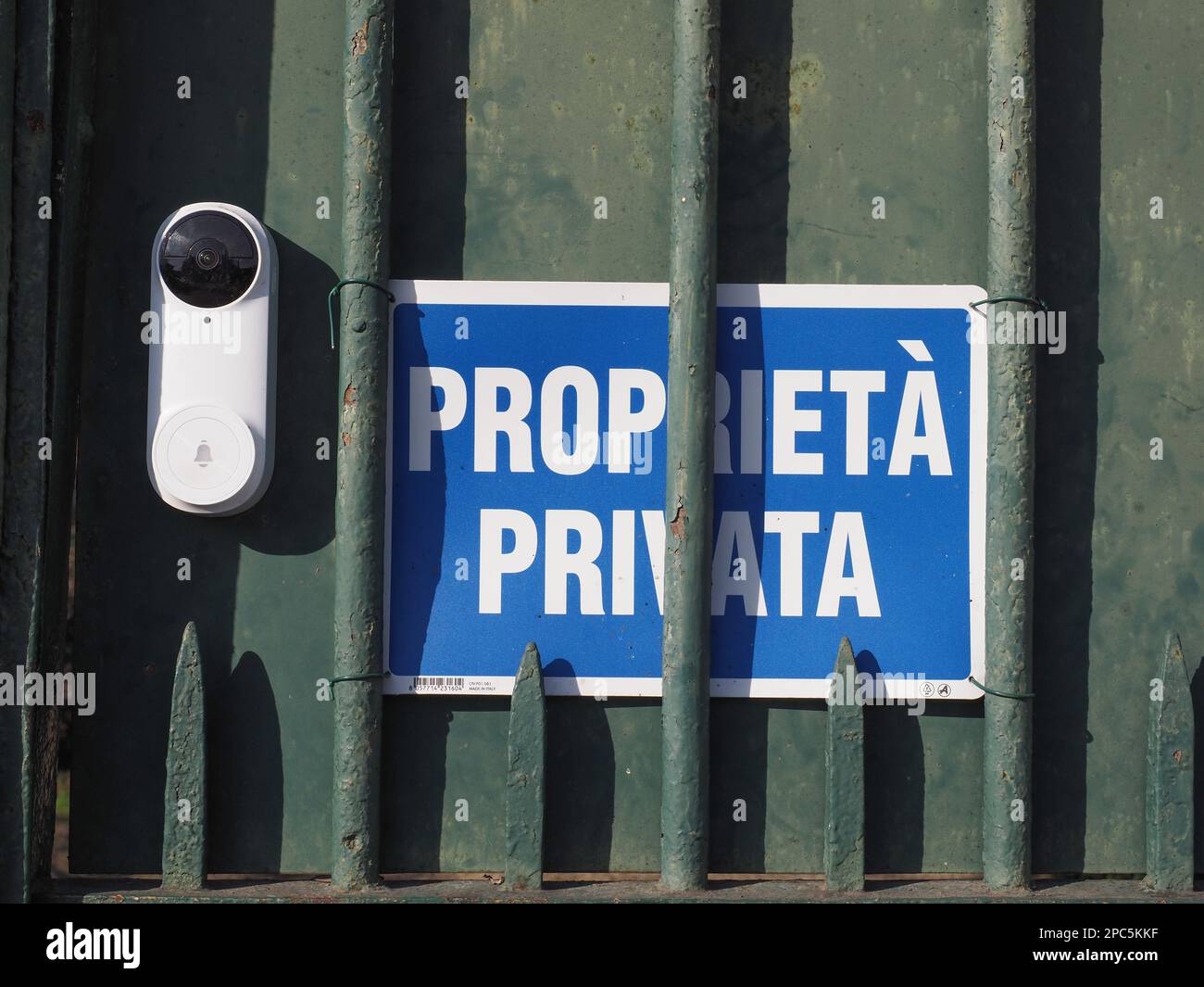 proprieta privata translation private property sign on a gate Stock Photo