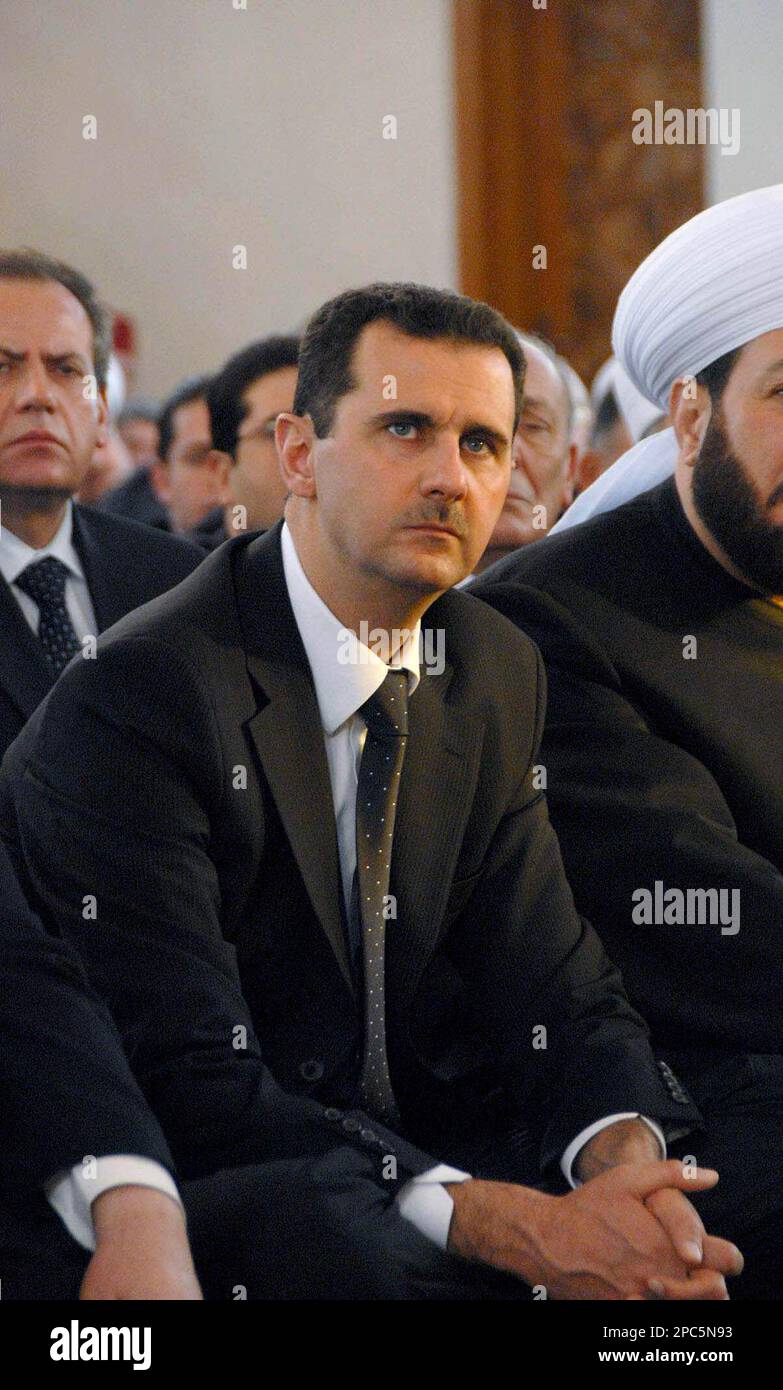 Syrian President Bashar al-Assad attends prayers during Eid al 
