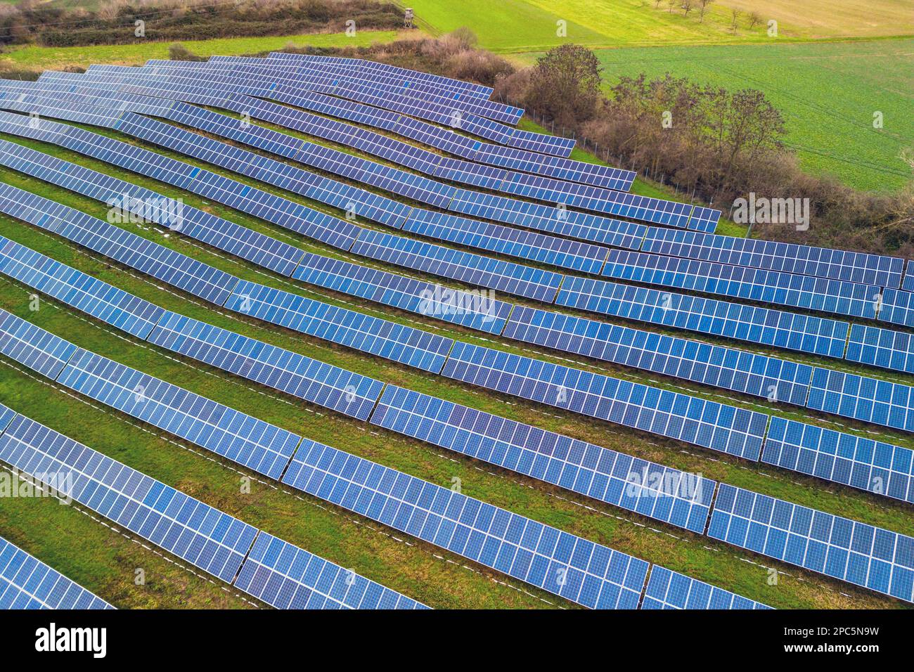Module of a large photovoltaic solar panels on an open space of a solar park in a rural environment in Germany Stock Photo