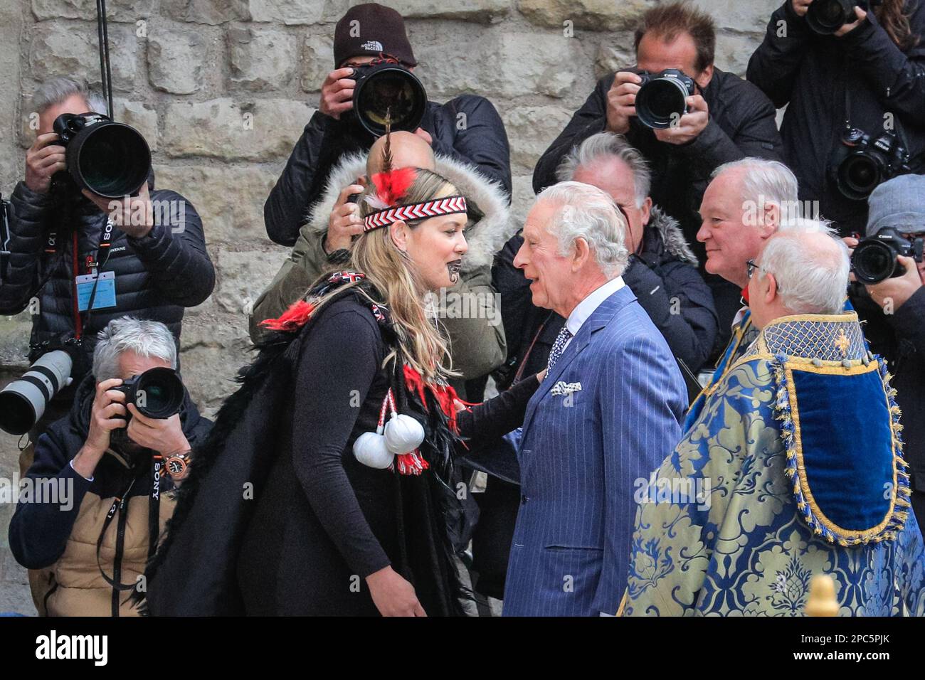 London, UK. 13th Mar, 2023. King Charles III greets Reanne Pomtana (Ngati Ranana London Maori Club) at Westminster Abbey with the hongi, a traditional Maori greeting, by pressing the nose and forehead together. King Charles and Camilla, the Queen Consort. Politicians, Royals and guests arrive and depart form today's Commonwealth Service held at Westminster Abbey in central London Credit: Imageplotter/Alamy Live News Stock Photo