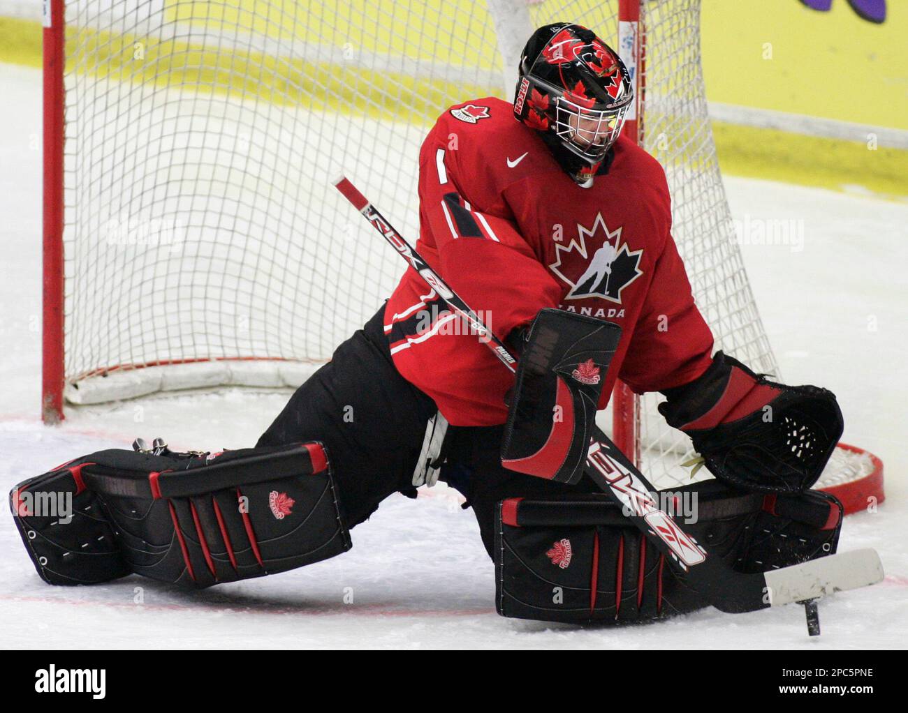 Team Canada goalie Carey Price makes a save in their 3-1 win over team Germany during the World U20 hockey championship Friday, Dec
