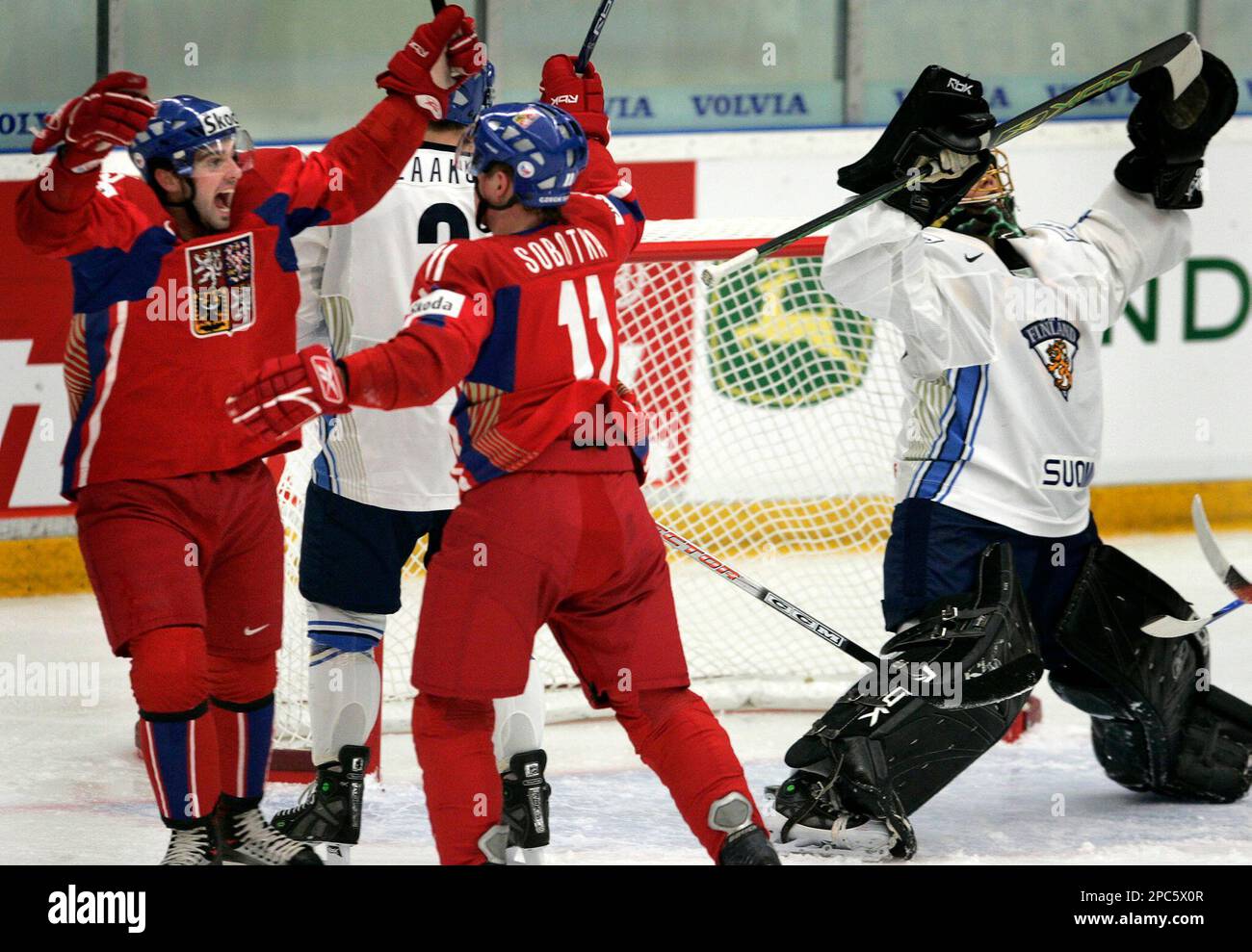 Czech Republic's Michael Frolík, left, fights with Finland's Markus Nurmi  during the Channel One Cup ice hockey match in Prague, Czech Republic,  Thursday, Dec. 16, 2021. (Michal Kamaryt/CTK via AP Stock Photo -