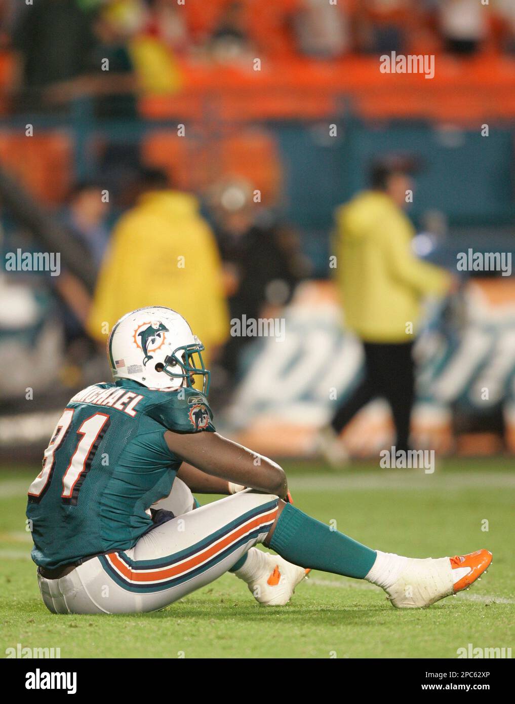 Pittsburgh Steelers Strong Safety Troy Polamalu (43) tackles Miami Dolphins  Tight End Randy McMichael (81) during a second quarter downpour on  September 26, 2004 at Pro Player Stadium in Miami, Fl. The