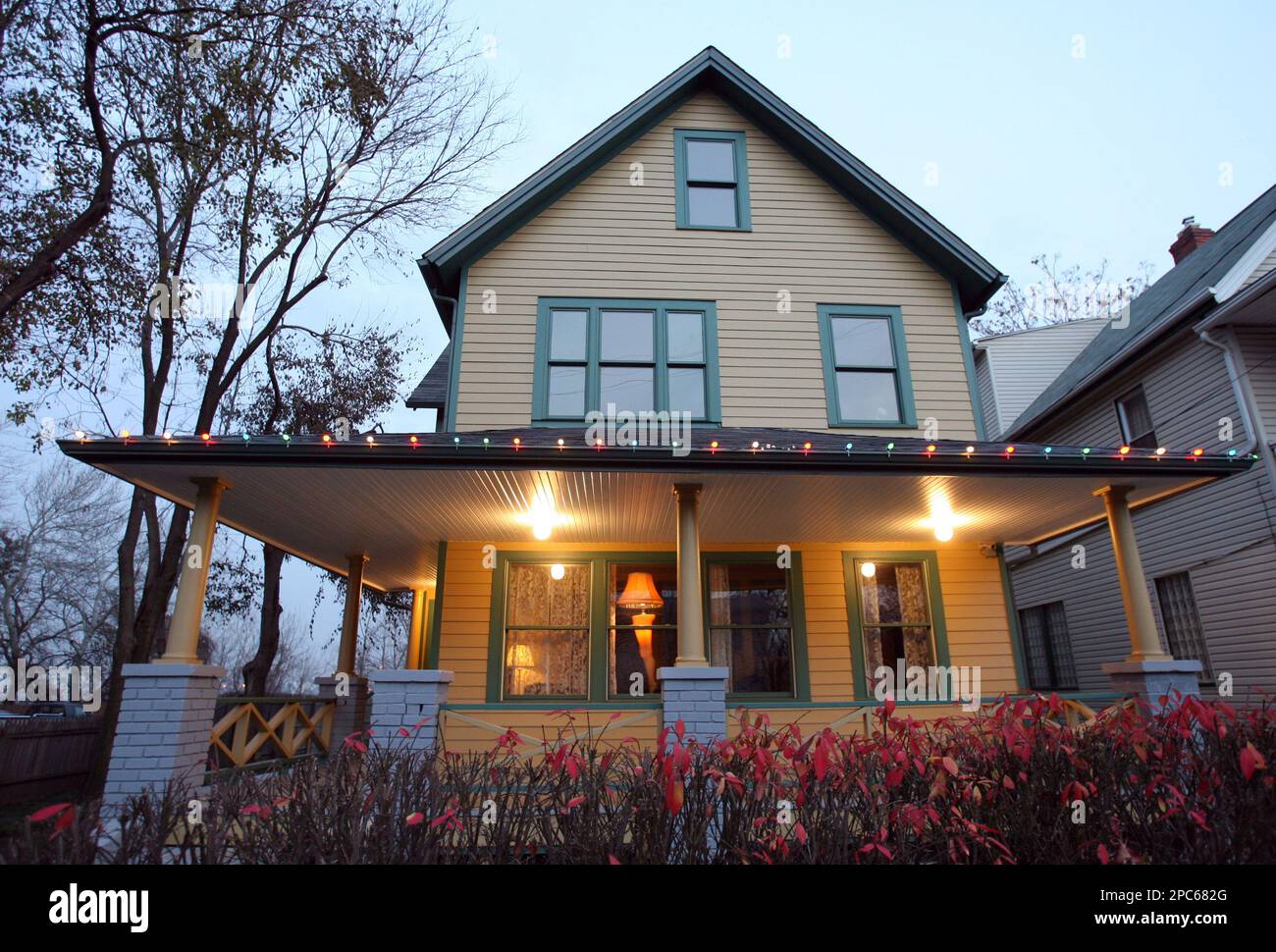 A leg lamp glows in the window of the Christmas Story House and Museum