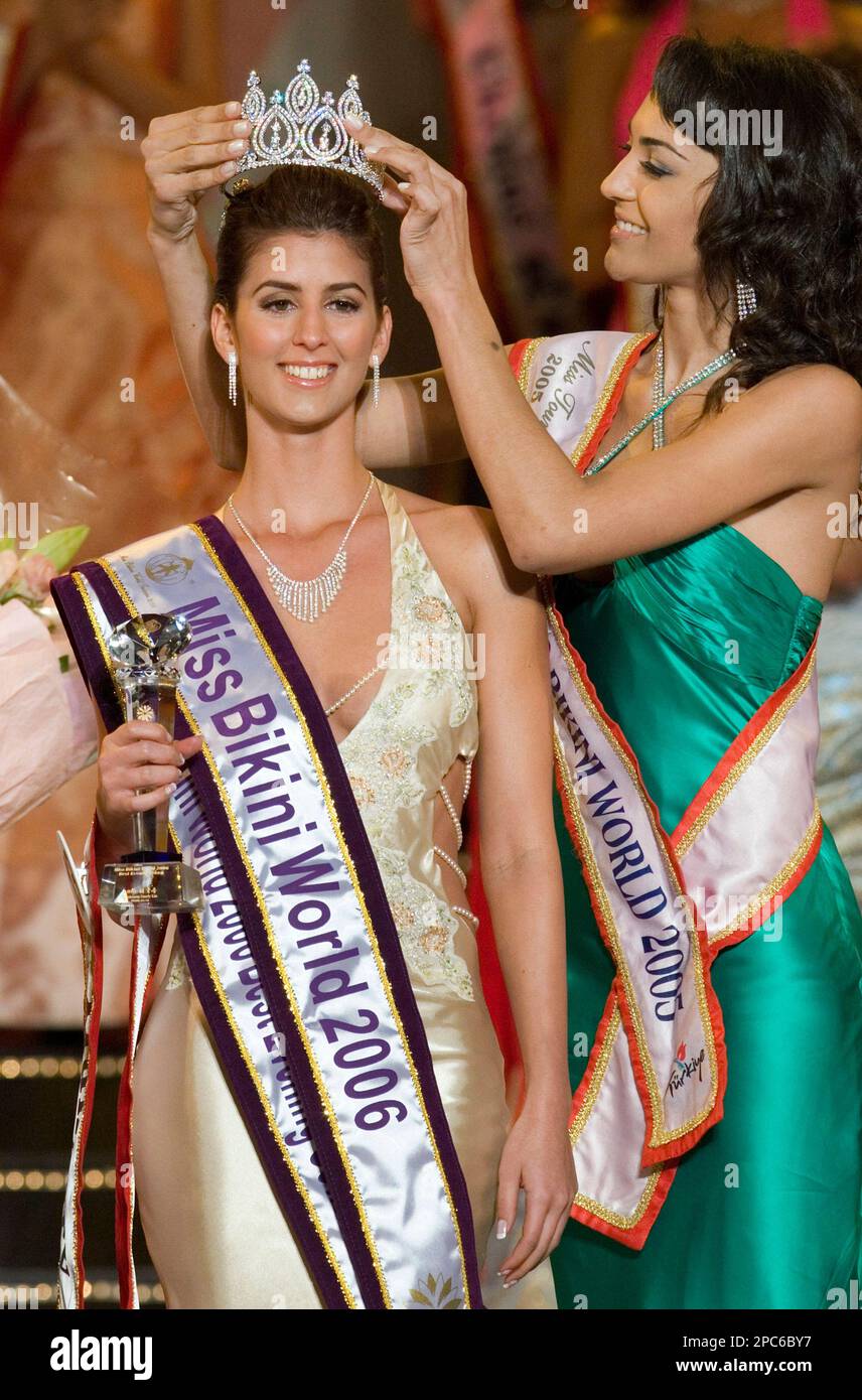 Hungary's Anita Horvath is crowned Miss Bikini World 2006 by Miss Bikini  World 2005 Cristiane Biazioli, right, during the Miss Bikini World Final  pageant, in Taipei, Taiwan, Thursday, Dec. 21, 2006. The
