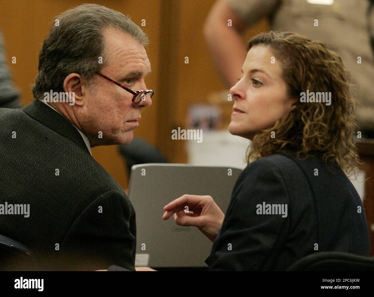 Defendant Michael Goodwin sit with his defense attorney, Elena Saris ...