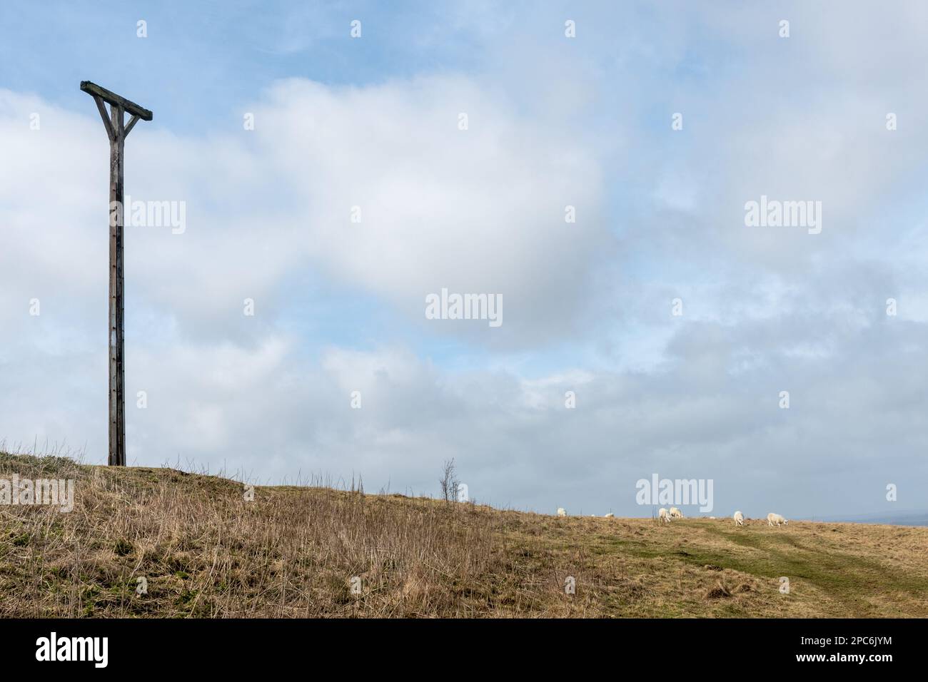 View of Combe Gibbet at the top of Gallows Down in Berkshire, England, UK, a historic landmark and visitor attraction Stock Photo