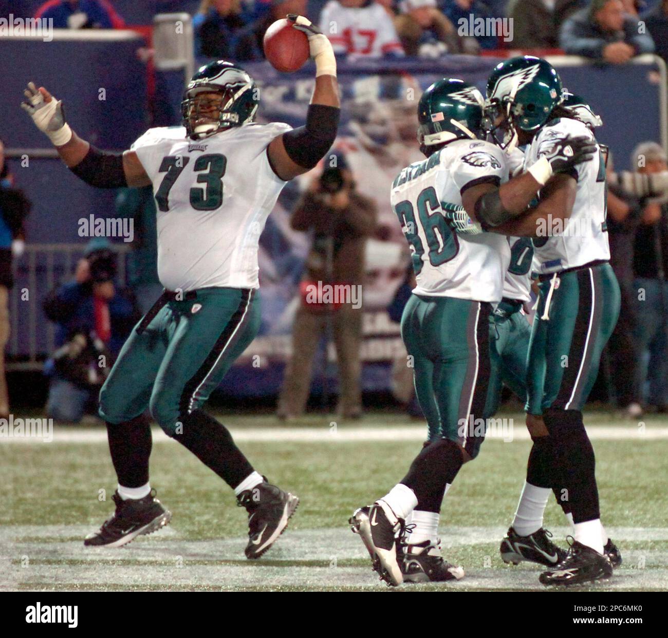 Philadelphia Eagles guard Shawn Andrews (73) spikes the ball as running