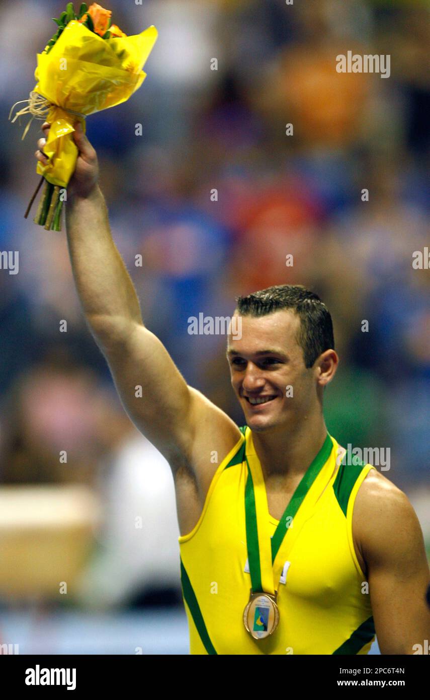 Brazil's Diego Hypolito celebrates in the podium after winning the Floor Exercise during the Artistic Gymnastics World Cup Final in Sao Paulo, Saturday, Dec. 16, 2006. (AP Photo/ Andre Penner) Stock Photo