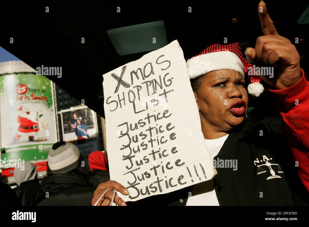 Protester Rene Wright, of Brooklyn, NY, participates in a march 