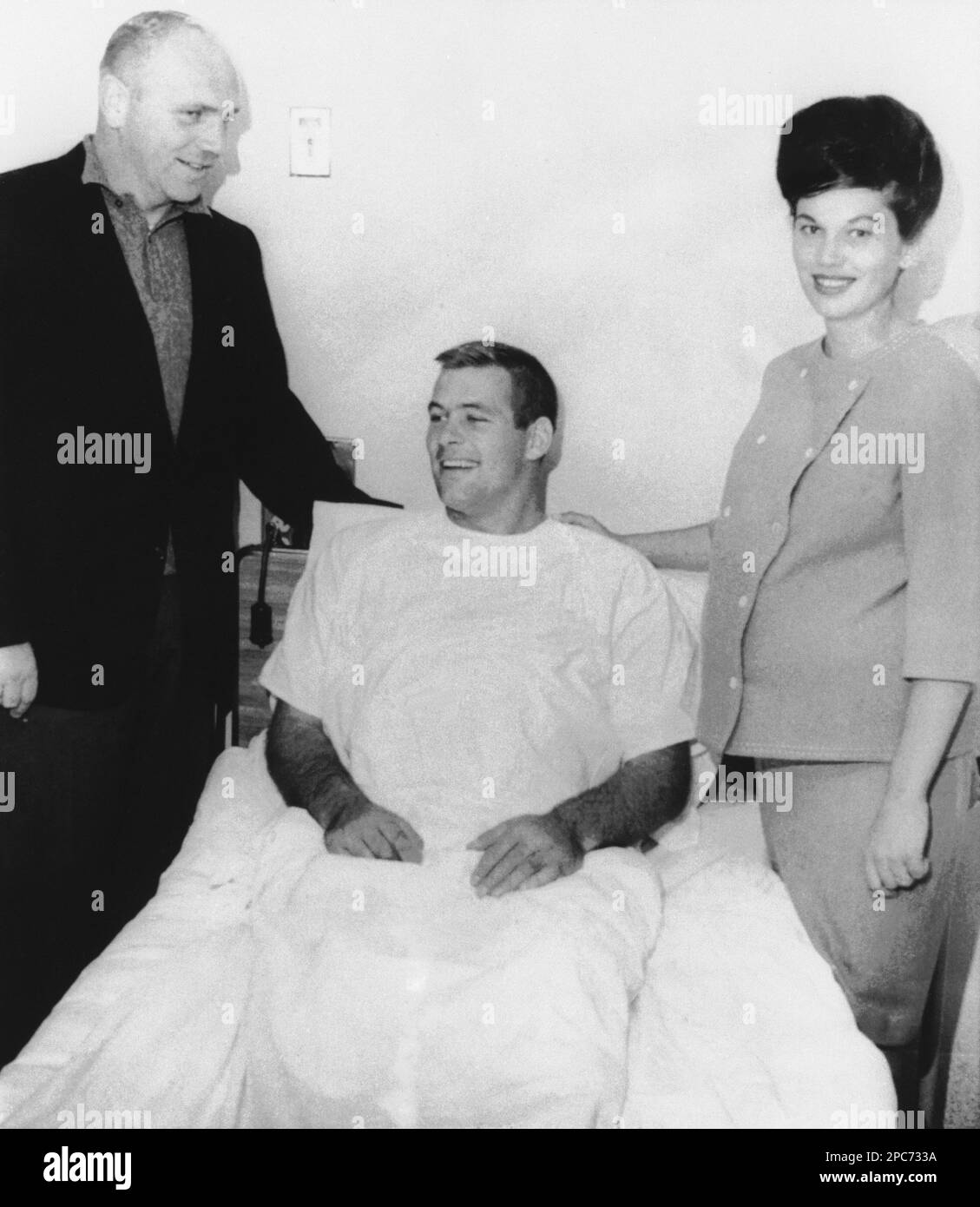 Green Bay Packer player Jerry Kramer smiles from his hospital bed while