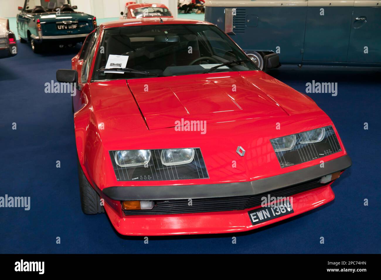 Three-Quarters Front View of a Red, 1980, Renault Alpine A310, on display at the 2023 London Classic Car Show Stock Photo