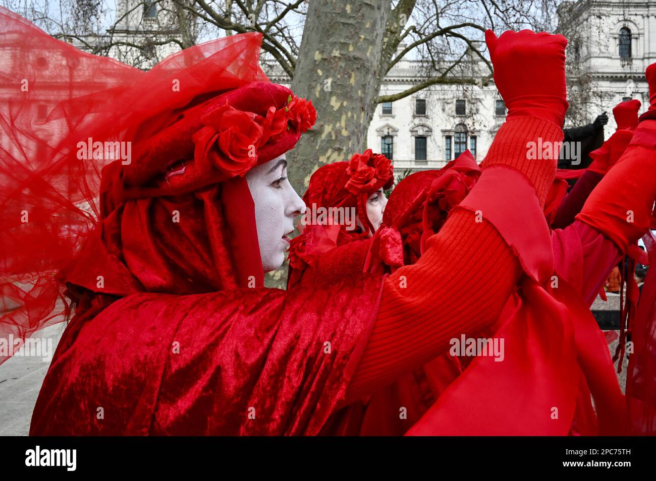 London, UK. Red Rebel Brigade. Extinction Rebellion protested in Parliament Square against the UK Government's blocking of a law that requires water companies to refrain from dumping raw sewage in our waterways and seas. Credit: michael melia/Alamy Live News Stock Photo