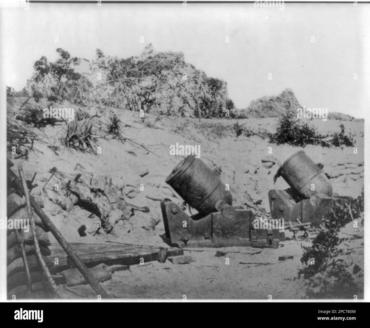 Two trench mortars behind sandbagged barricade. Civil War Photographs