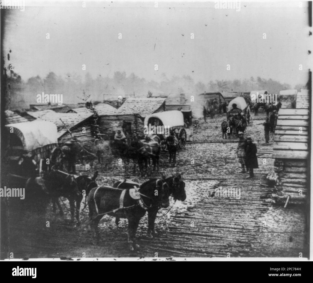 Camp of the Union forces at Centreville, Virginia Winter 1861-62. Title from item, Gift; Col. Godwin Ordway; 1948. Carts & wagons, Union, Virginia, Centreville, 1860-1870, Horse teams, Virginia, Centreville, 1860-1870, United States, History, Civil War, 1861-1865, Military facilities, Union, United States, History, Civil War, 1861-1865, United States, Virginia, Centreville. Stock Photo