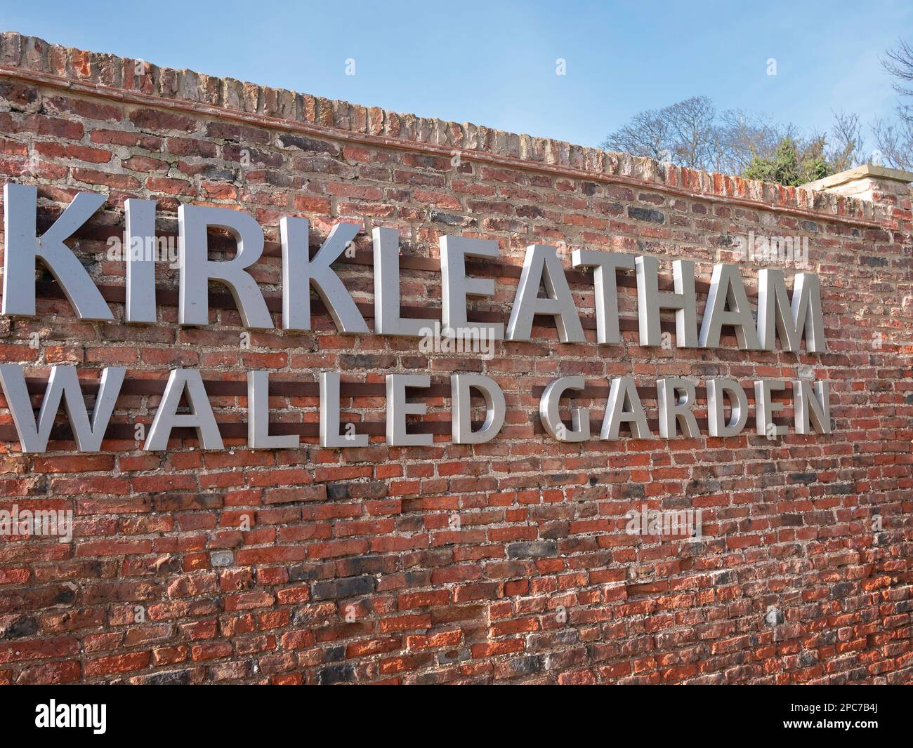 Sign for the Kirkleatham Walled Garden on an outer wall near the entrance Stock Photo Alamy