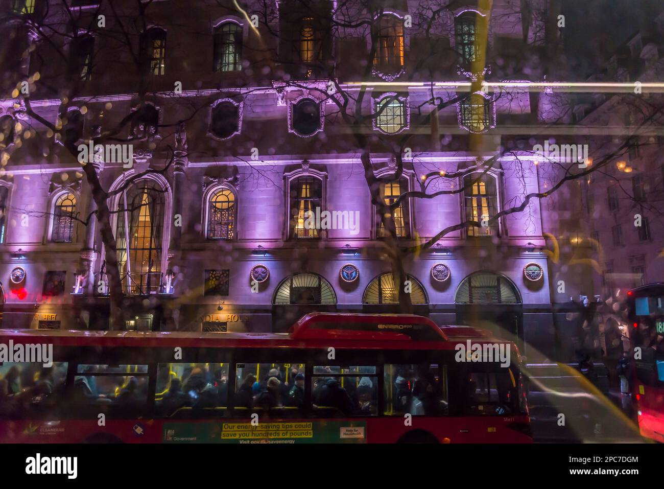 India House in Aldwych lit at night, London, England, UK Stock Photo