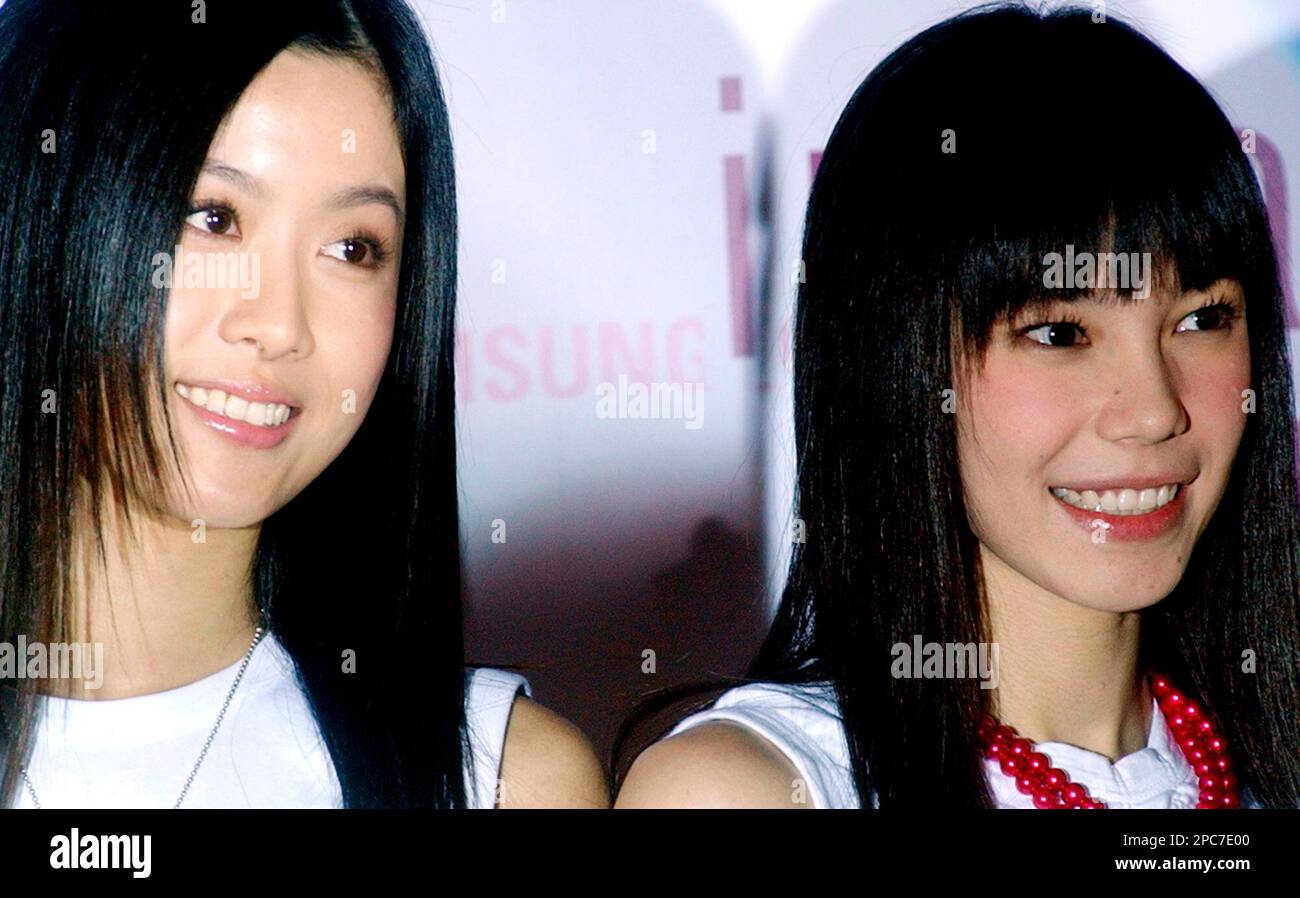 Jan Cheung, right, and Chucky Woo, left, of Hong Kong singing group ...