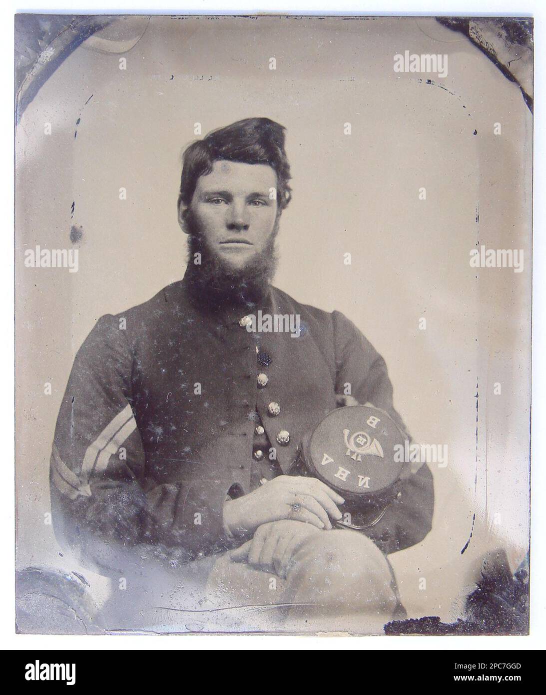 Unidentified soldier in Union corporal's uniform holding Company B, 15th New Hampshire