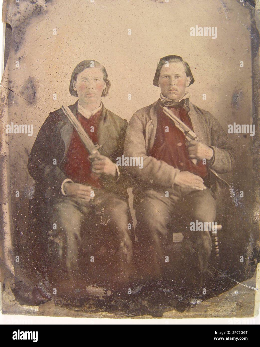 Two unidentified soldiers in non-regulation Confederate uniforms with ...