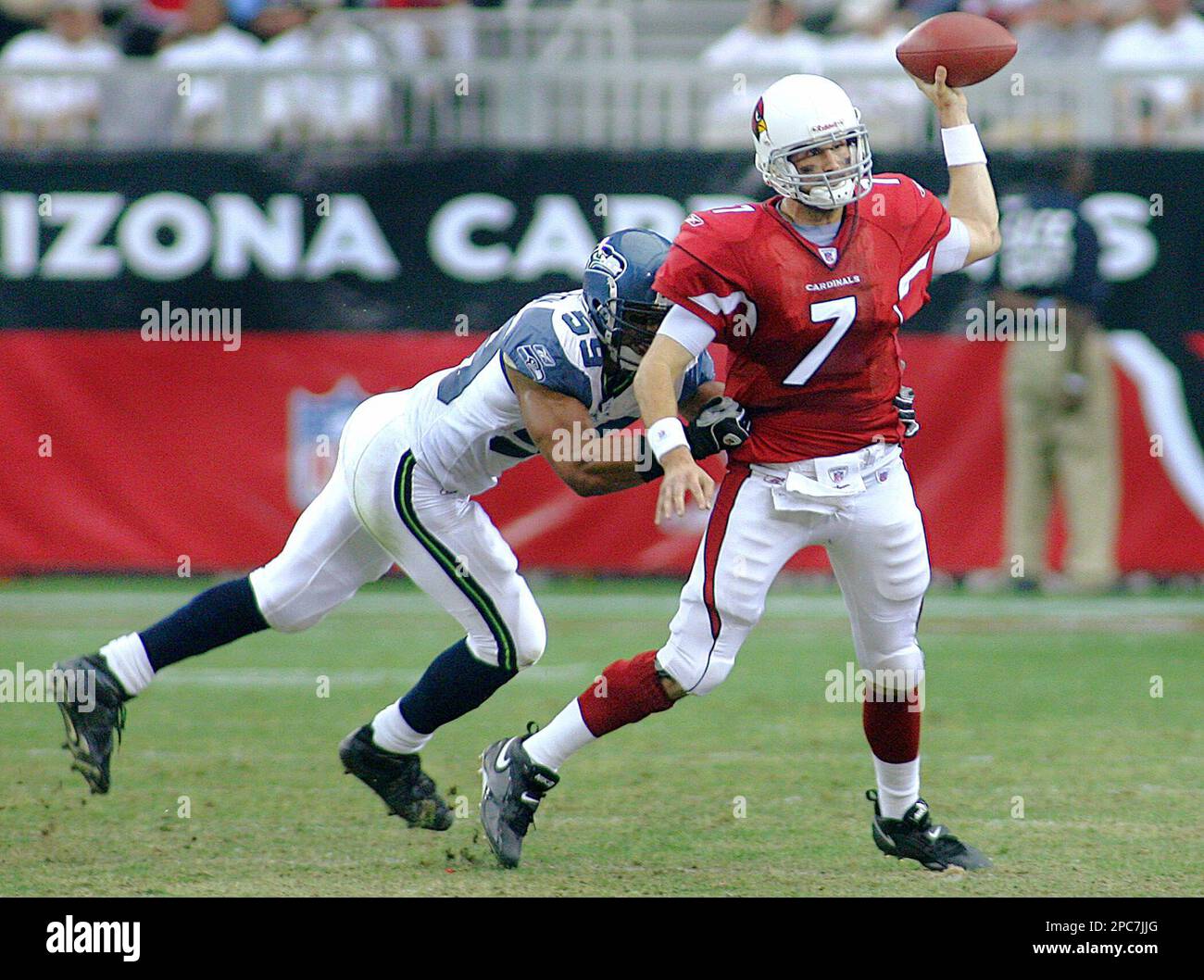 Seattle Seahawks linebackers Julian Peterson, left, and LeRoy Hill  celebrates Hill's sack of Arizona Cardinal quarterback Kurt Warner in the  second quarter Sunday, September 17, 2006 in Seattle. (UPI Photo/Jim Bryant  Stock