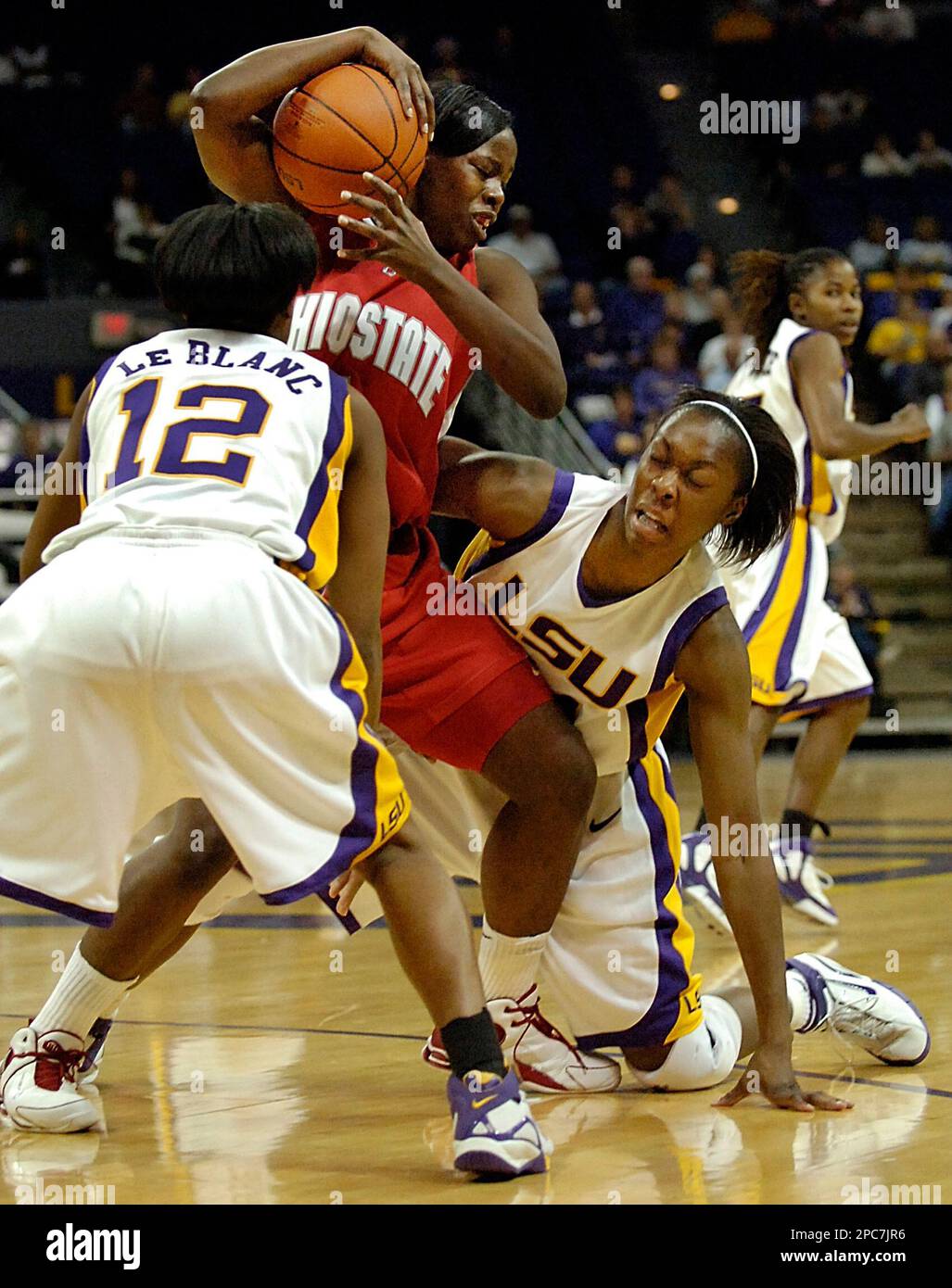 Louisiana State's RaShonta LeBlanc (12) and Ashley Thomas, right