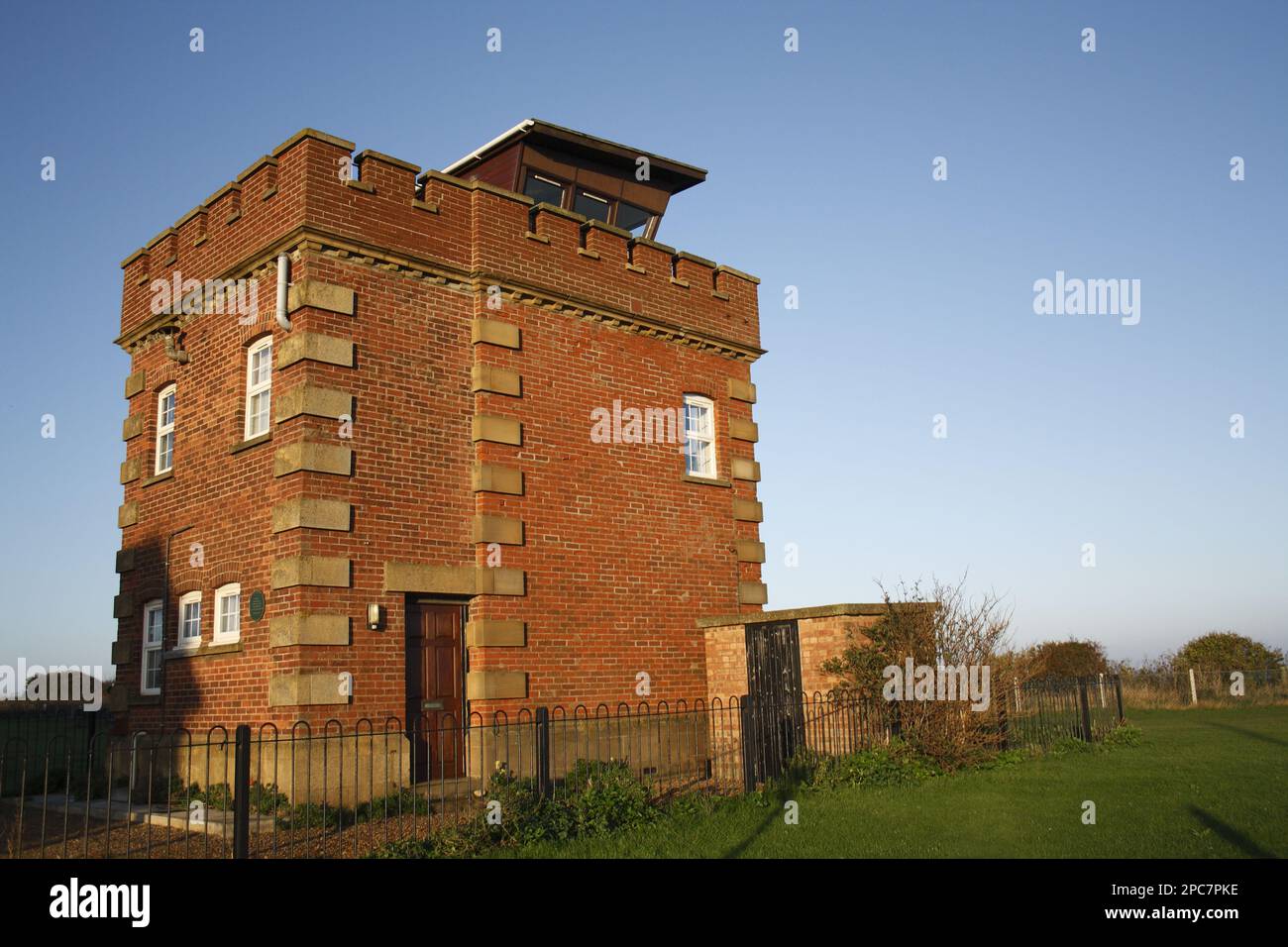 Former coastguard lookout tower and Marconi wartime listening post, on coastal clifftop at dawn, Old Hunstanton, Norfolk, England, United Kingdom Stock Photo